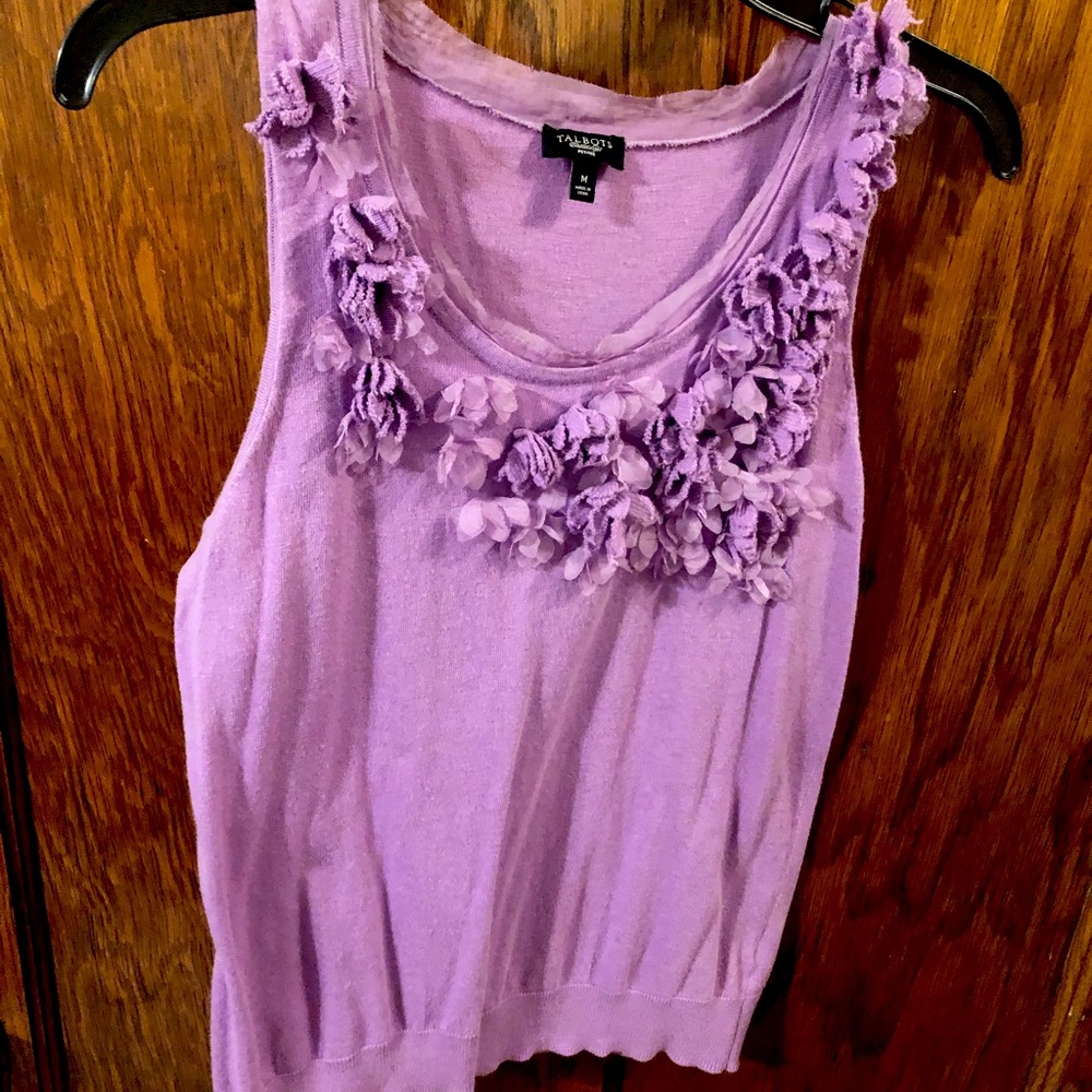Orchid sweater tank with floral embellishments.